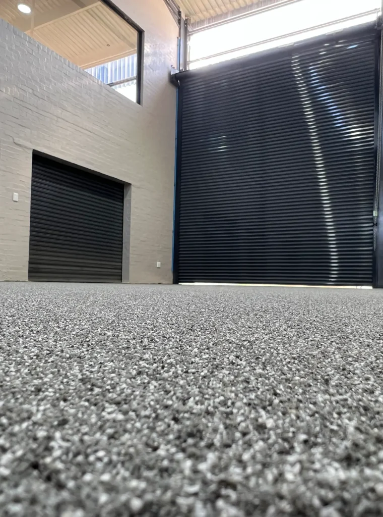 Finished epoxy floor by epoxy flooring manufacturer Africa in an industrial space Finished epoxy floor by epoxy flooring manufacturer Africa in an industrial space